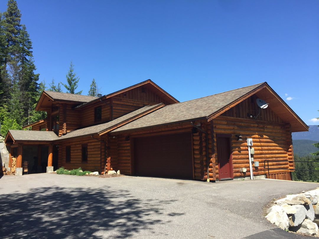 Log home in Kahler Glen stained with Lovitt's Natural Gold oil based stain in "Natural" color